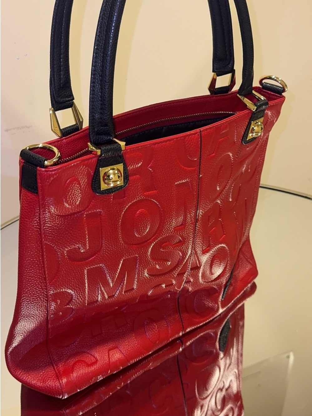 Red AIDRANI Embossed Leather Tote Bag with Black Handles